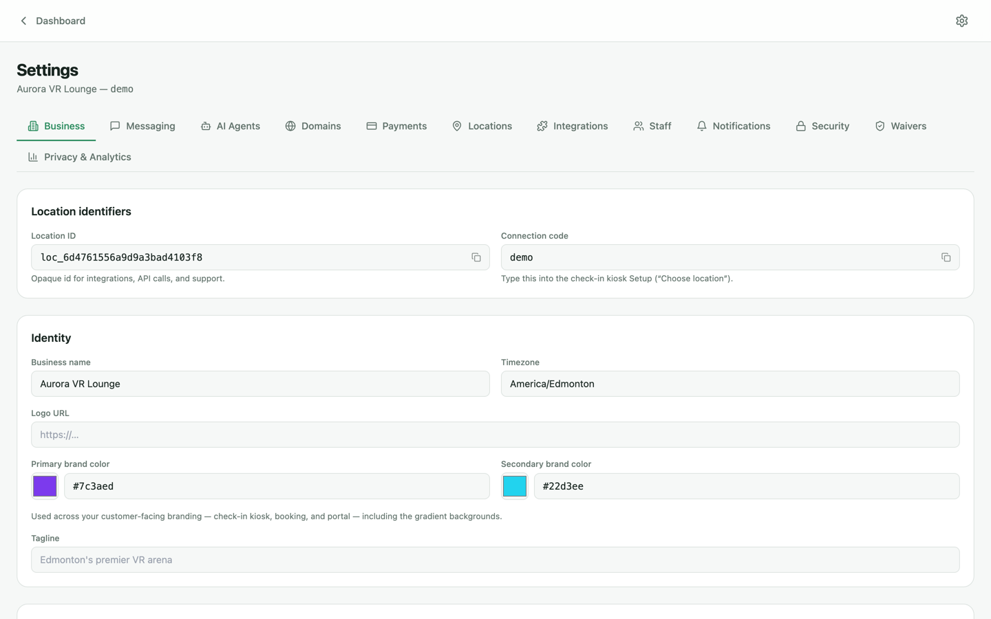 Settings Business tab with location identifiers, business name, timezone, logo and brand colors